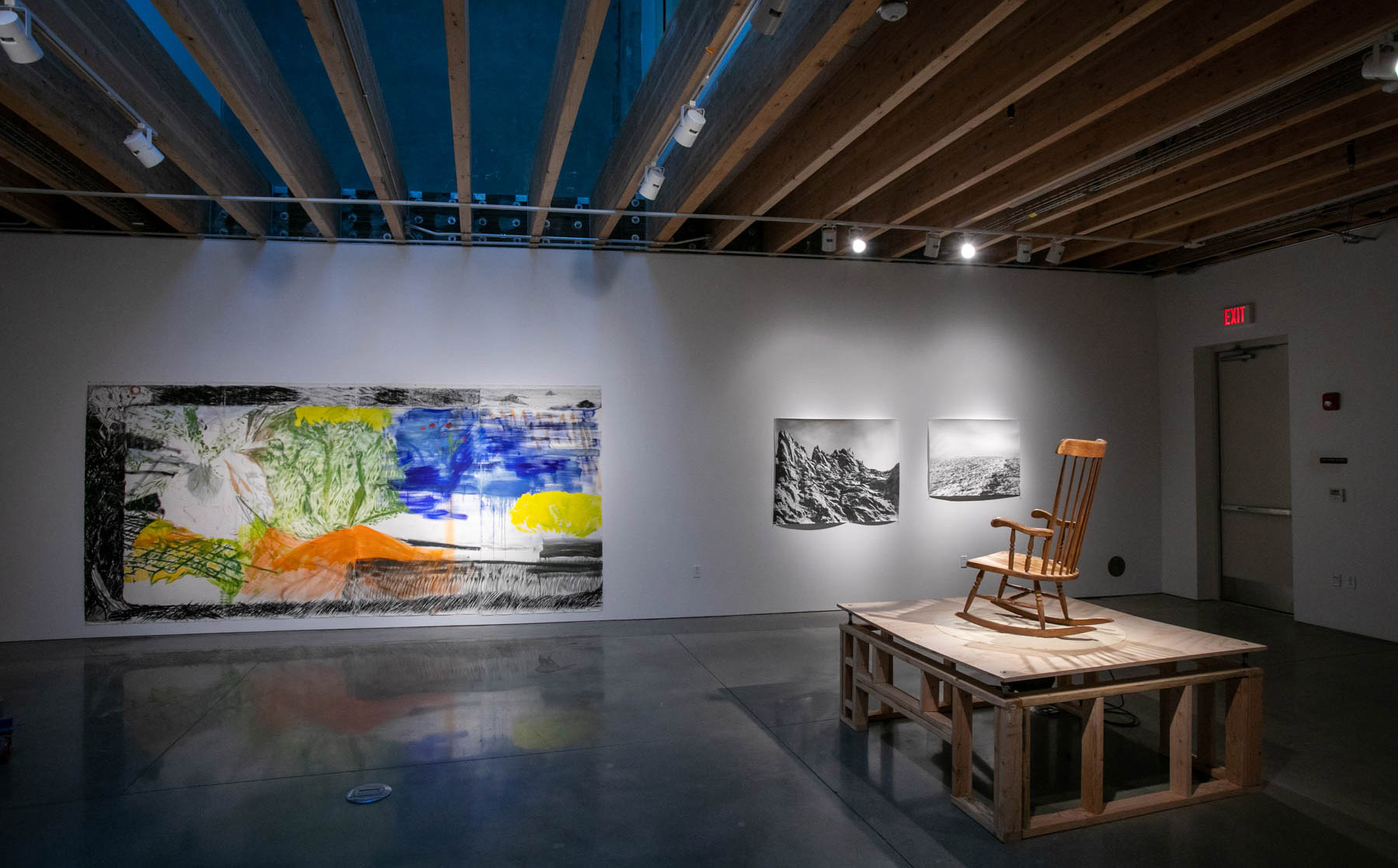Paintings and sculpture installed in the Center Bay Gallery