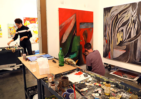 Students work in a painting studio