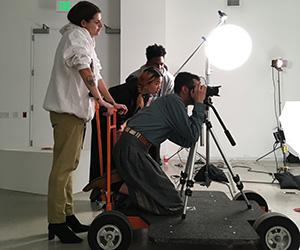 Students with a camera on a dolly